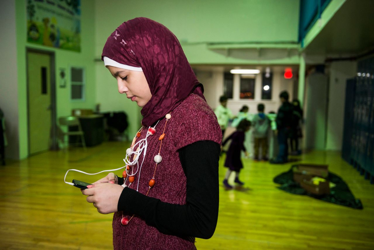 Nabiha, 13, spends an inordinate amount of time on her smartphone, listening to music by Adele or by Syrian singers and chatting with friends on WhatsApp.