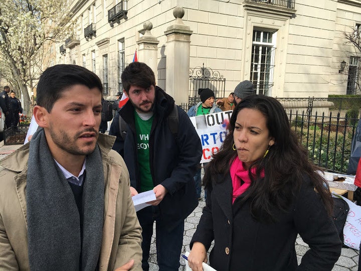 Puerto Rico lawmaker Manuel Natal (left) and a fellow activist outside International House in Manhattan.