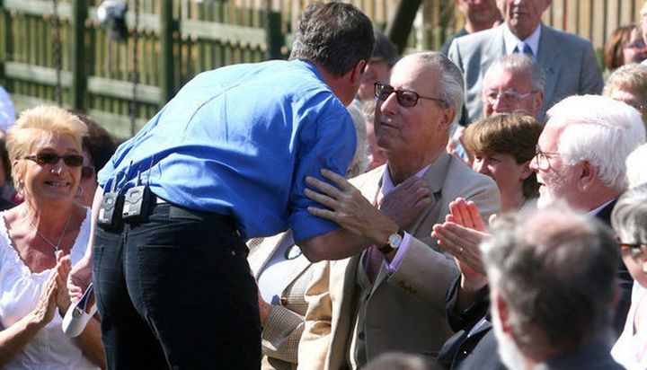 Cameron embraces his late father Ian Cameron
