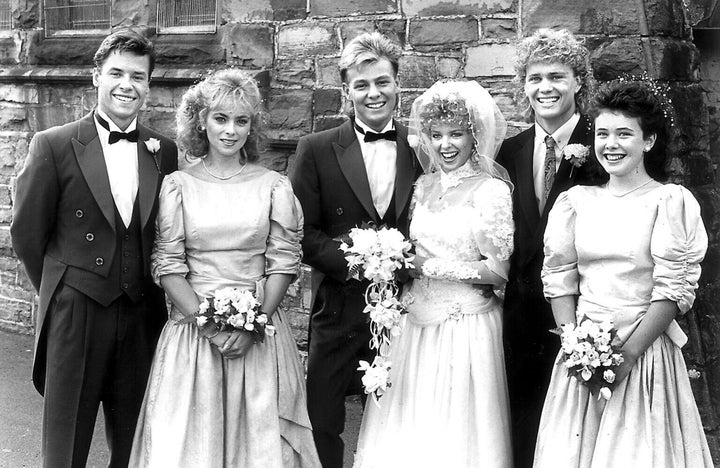 Guy's character Mike (far left) was a guest at Scott and Charlene's wedding, which was watched by more than 20 million Brits in 1988.