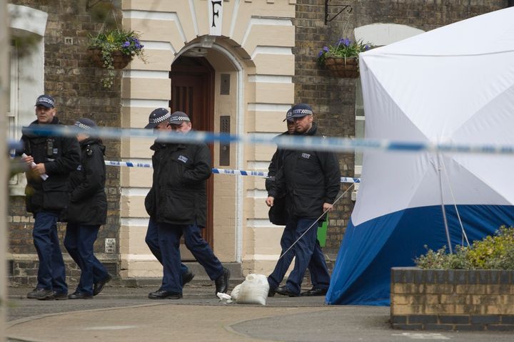 Police officers at a Southwark Estate where human remains were found on Thursday 200ft from where Semple was last seen