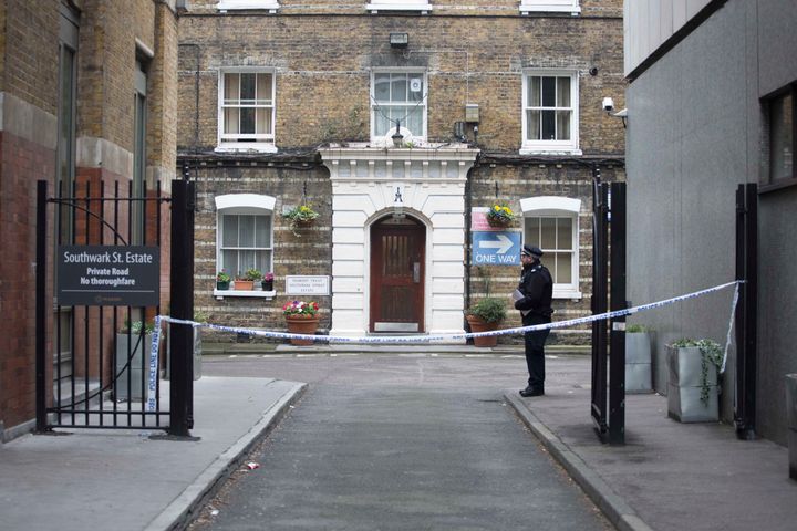 Neighbours of a property where Pc Gordon Semple's body has told of the 'smell of death' coming from the flat