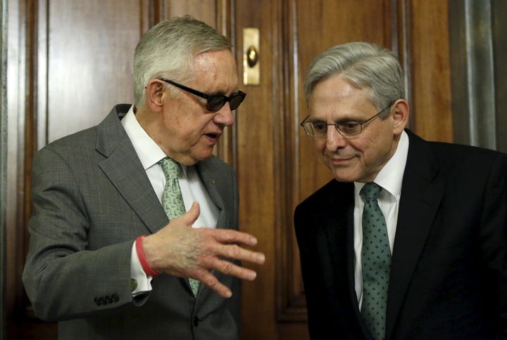 Senate Minority Leader Harry Reid (D-Nev.), left, meets with President Barack Obama's Supreme Court nominee Merrick Garland, right, on Capitol Hill on March 17. Democratic senators have not been able to secure a vote on Garland.