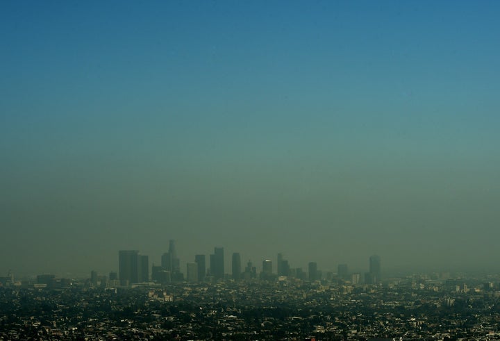 The Los Angeles skyline rich with smog covers one of the biggest ports in America.