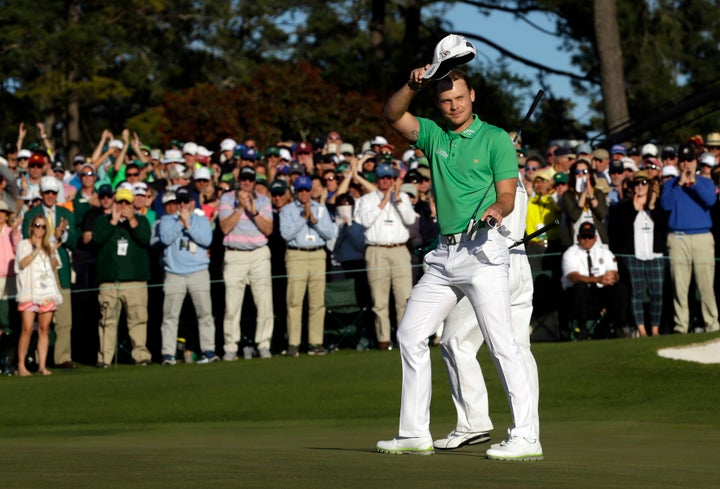 Apr 10, 2016; Augusta, GA, USA; Danny Willett waves to the crowd after completing the 18th hole during the final round of the