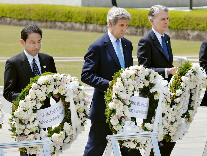 Japan's Foreign Minister Fumio Kishida (left), U.S. Secretary of State John Kerry (middle) and Britain's Foreign Minister Philip Hammond (right) laid wreaths at the Hiroshima Peace Memorial Park and Museum in Hiroshima, Japan on Monday.