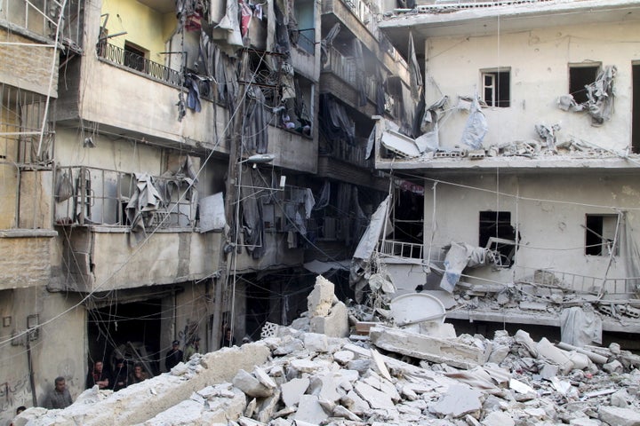 Rania and Mazd's hometown, Aleppo, was once a bustling center for culture and commerce. By the time they left, the city was divided in two. This photo shows the aftermath of an airstrike in the al Saliheen district in the city.