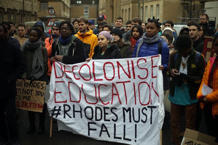 Students march through Oxford as part of the #RhodesMustFall campaign in March 2016