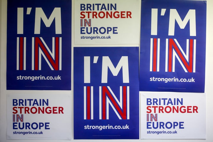 Posters are pinned on a wall at the "Britain Stronger In Europe" campaign offices in London.