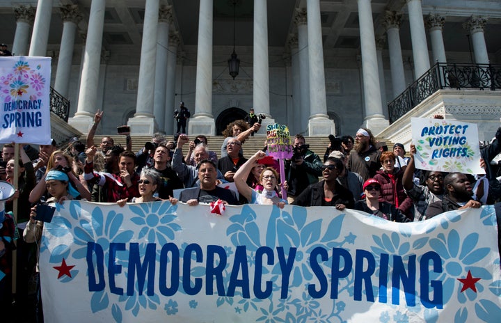 Democracy Spring activists staged a civil disobedience action on the steps of the Capitol building in Washington, D.C., on Monday to protest the way political campaigns are funded and attempts to reduce the right to vote.