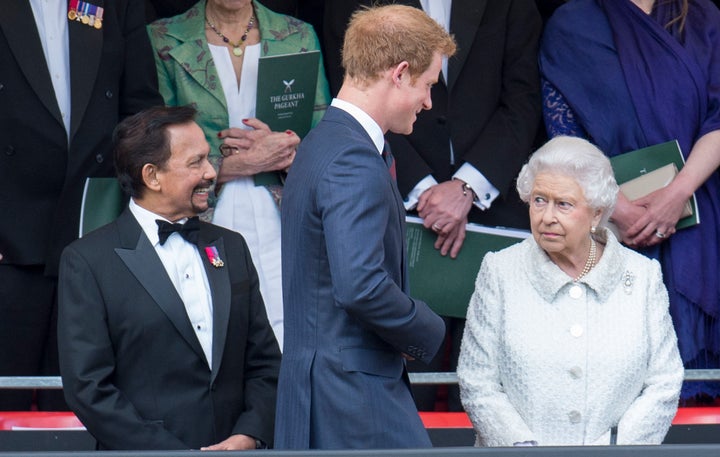 Britain's Prince Harry at a pageant with Queen Elizabeth II.