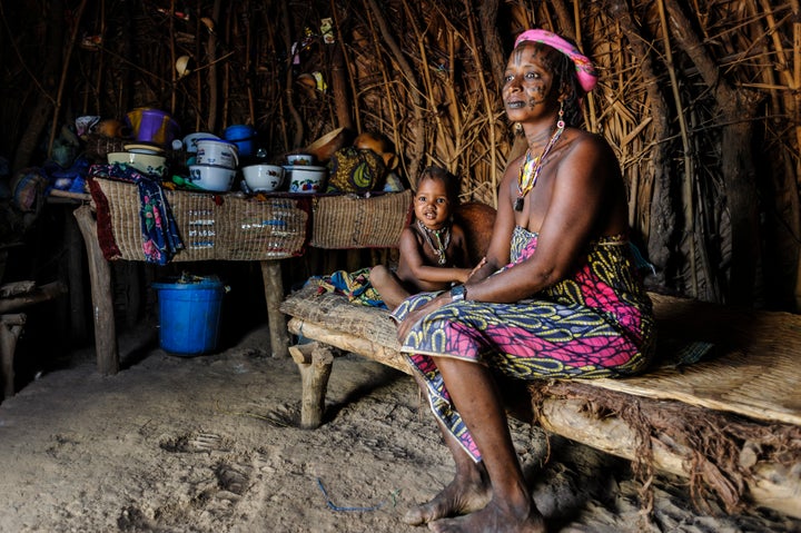 CAMEROON - 2015/04/13: Mbororo woman with her child inside her hut . (Photo by Jorge Fernández/LightRocket via Getty I