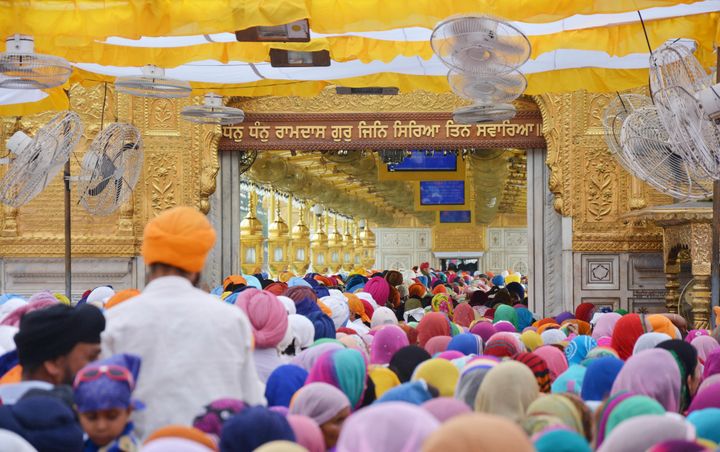 Devotees paying obeisance at Golden Temple on the occasion of Baisakhi Festival on April 14, 2015 in Amritsar, India