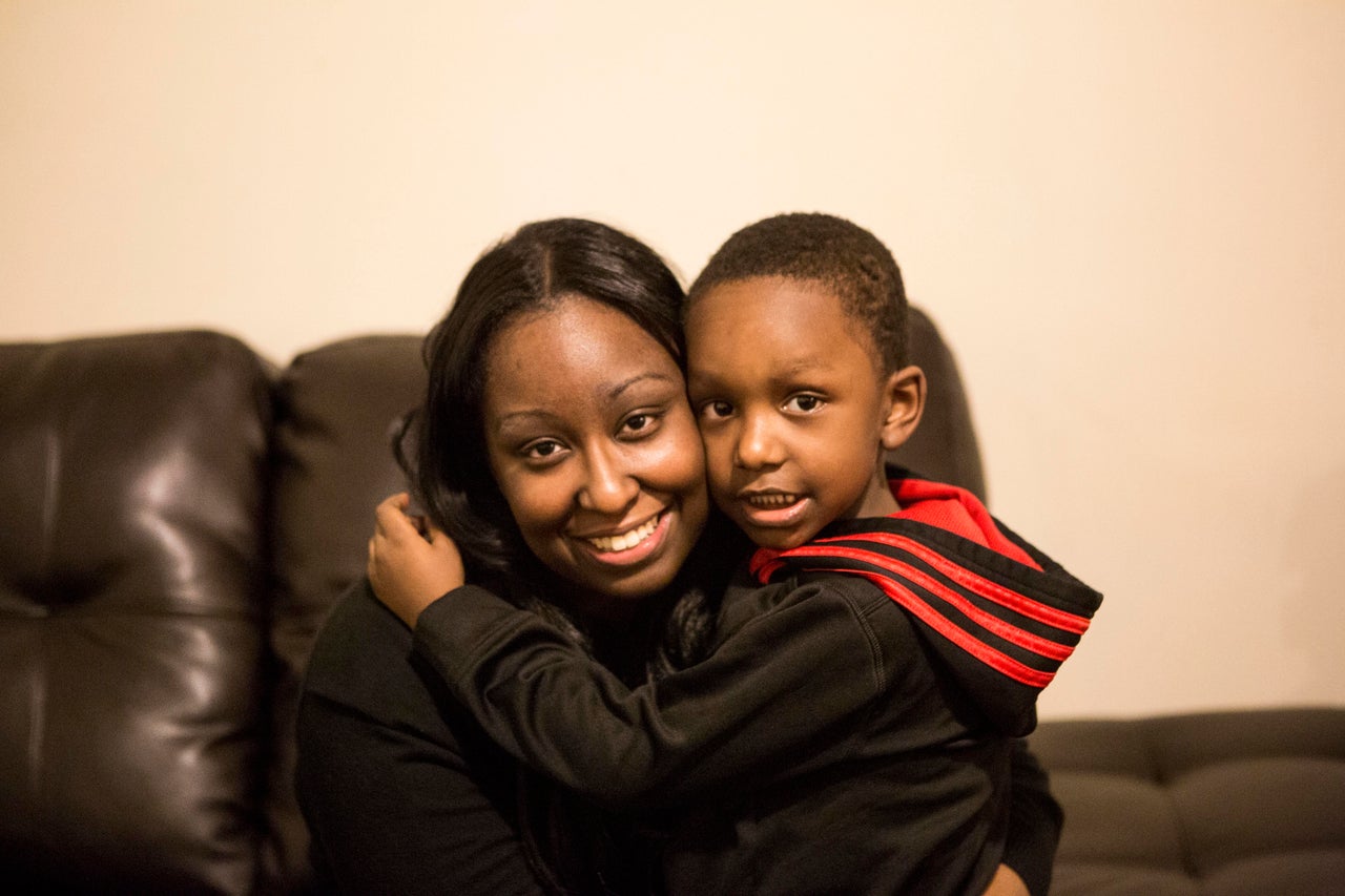 Baldwin hugs her son after being released from prison. "My life changed in an instant," she said.
