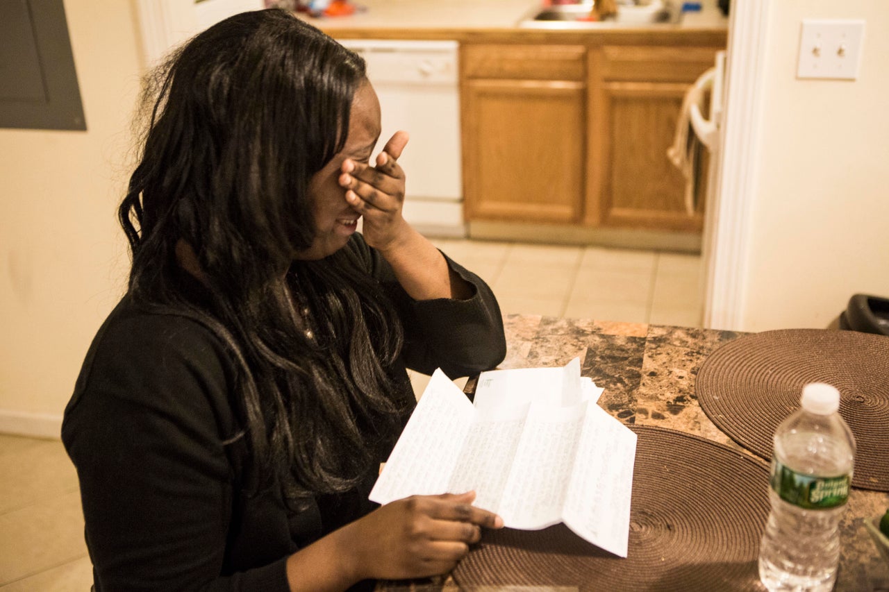 Baldwin reads a letter from her former cellmate. "There are a lot of women incarcerated because of men," she said.