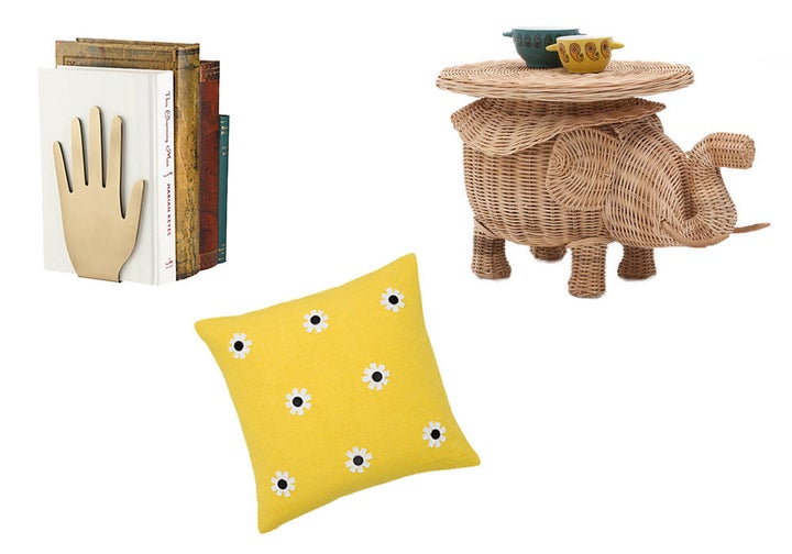 Side Table: Elephant Shaped Table, 89.90; zarahome.comBook Ends: Zadie Drive Hand Book Ends, $50; katespade.comPillow: Flower Decorative Pillow, $50; katespade.com