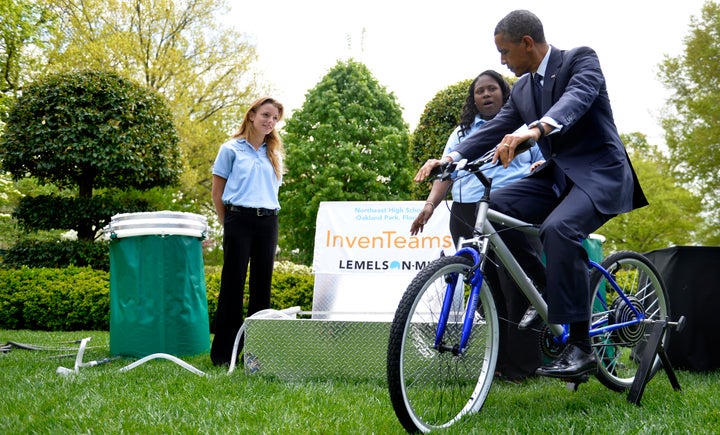 Obama tested out the pedal-powered filtration system created by Payton Kaar, 18, and Kiona Elliott, 18, at the 2013 White House Science Fair.