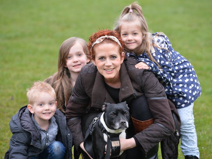 Lisa Johnson with her dog Marley and children Thea (7), Effy (5) and Freddie (3)