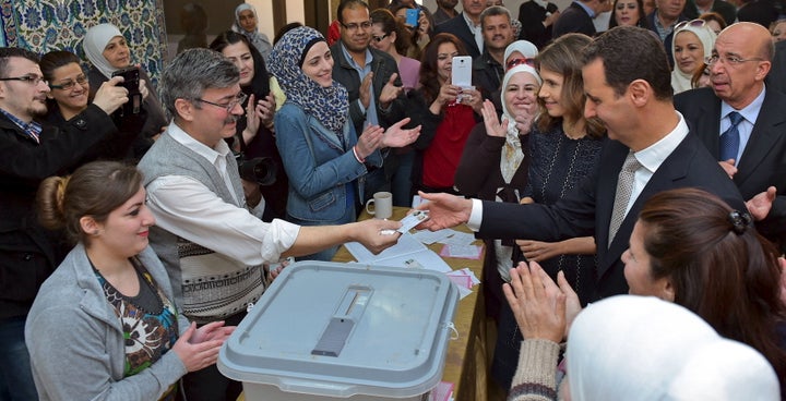 Assad, who voted in the elections for the first time, told state TV that terrorism had destroyed Syria's infrastruc