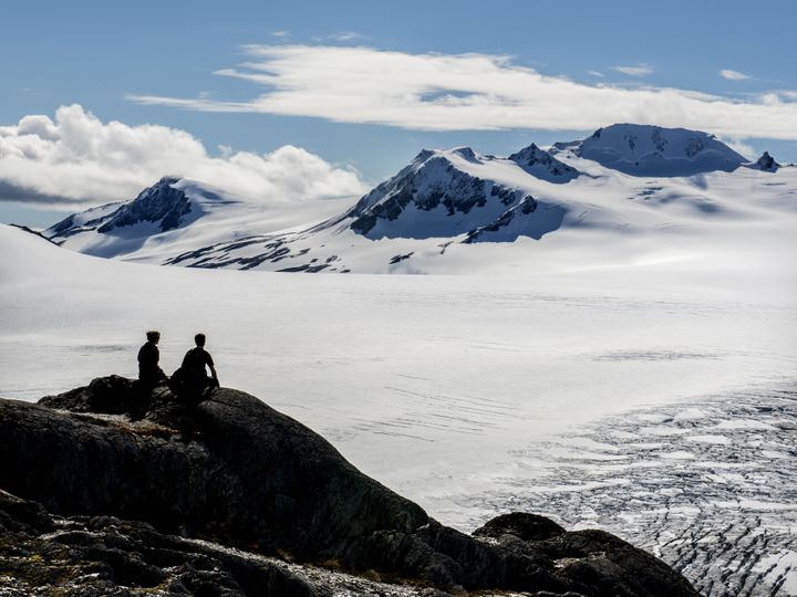 A young couple is seen overlooking Alaska's Harding Glacier Field in the Kenai Peninsula where a pair of skiers recently became trapped for four days.