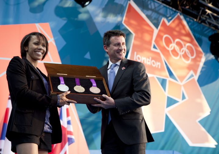 Opponents to a charge on the running group includes Dame Kelly Holmes, pictured with Lord Sebastian Coe