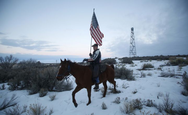 Duane Ehmer rode his horse and carried a flag at the Oregon occupation.