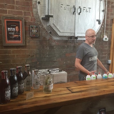 George Smith, founder and CEO, at Copper Barrel Distillery in North Wilkesboro, North Carolina, at his tasting bar. The distillery celebrates its first anniversary April 16.