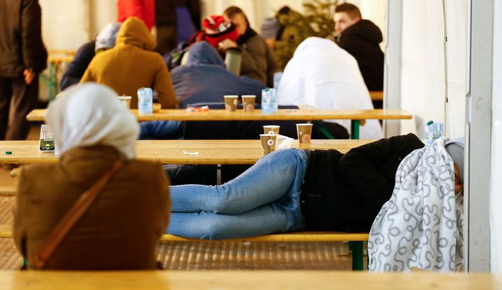 Many real estate companies and landlords in Europe do not want accept foreigners. A migrant rests on a bench at the Berlin Office of Health and Social Affairs.