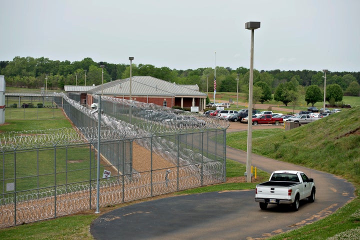 Fencing surrounds the Walnut Grove Correctional Facility in Walnut Grove, Mississippi, U.S., on Wednesday, April 17, 2013. In Mississippis four privately run prisons last year, the assault rate averaged three times as high as in state-run lockups. None was more violent than the Walnut Grove Youth Correctional Facility. Photographer: Daniel Acker/Bloomberg via Getty Images