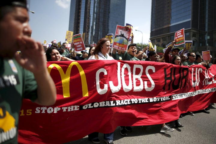 People in Los Angeles protest for a $15/hour minimum wage on Thursday.