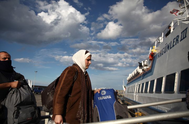 Syrian refugees board a boat bound for Turkey in November, 2014. With the E.U.–Turkey deal deterring refugees from attempting to travel to Greece, Syrians have few options other than to remain in Turkey.