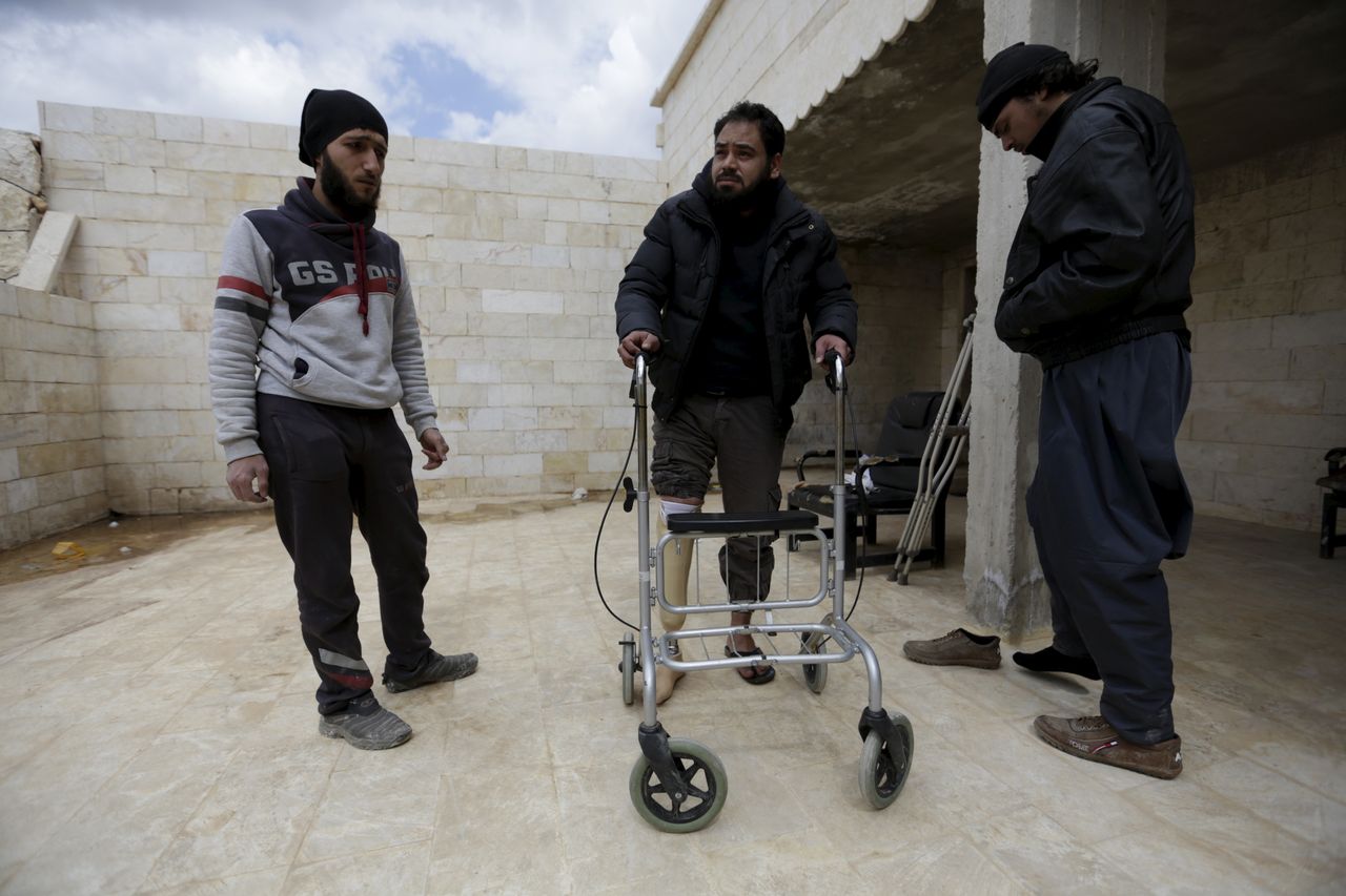 Demand from amputees far outstrips the services the clinic is able to provide. A man exercises with his artificial limb in Maaret al-Numan.