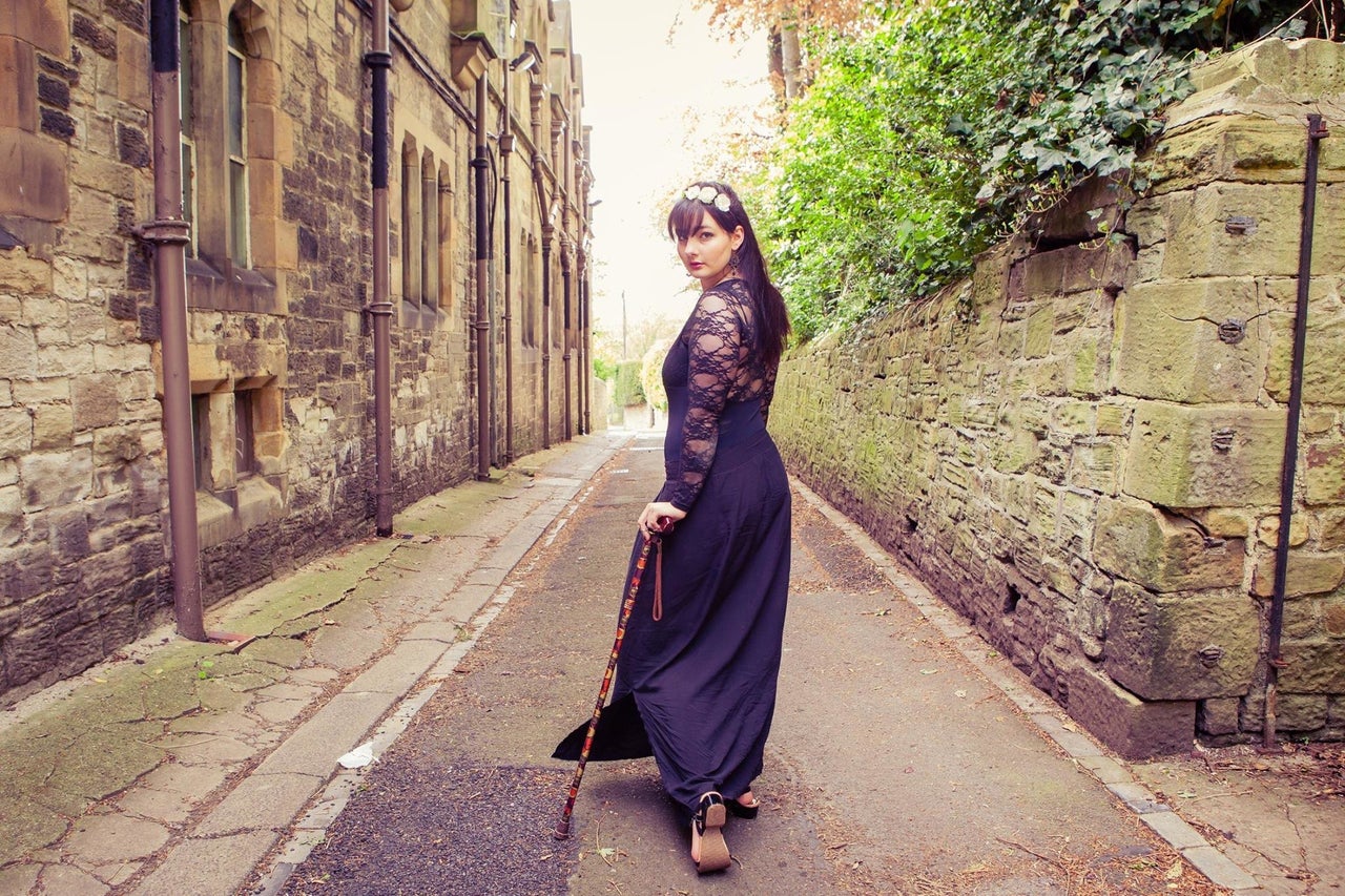 Lizzie at university in Durham, with her walking stick