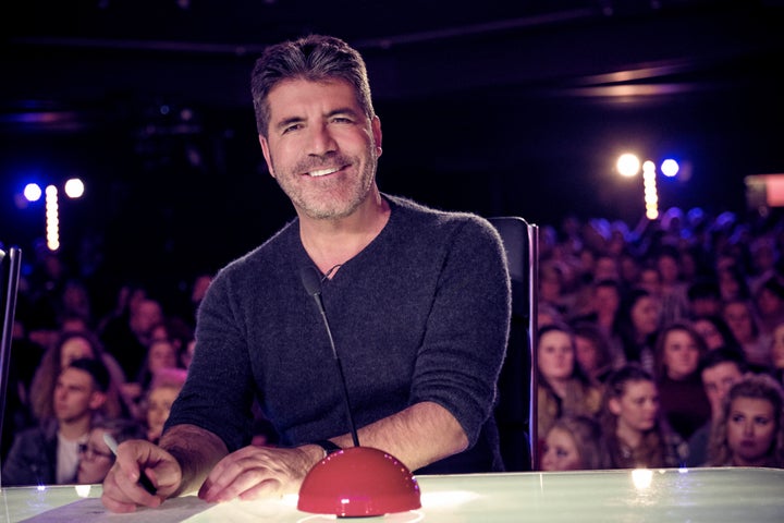 <strong>He may be all smiles here, but Simon Cowell was not happy with Alesha Dixon</strong>