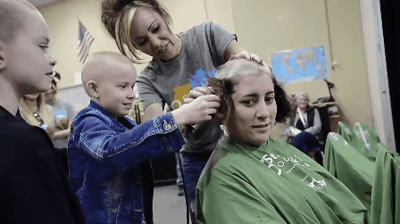 Marlee shaves a teacher's head.