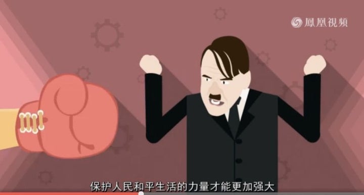 Hitler gets punched by a boxing glove.