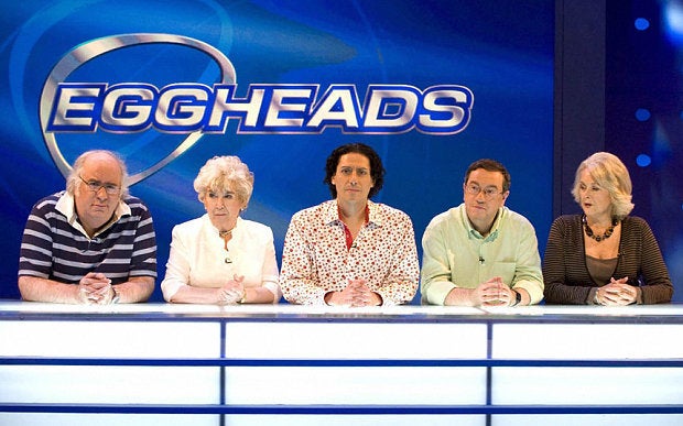 <strong>CJ (centre) has been on the 'Eggheads' panel since it debuted in 2003</strong>