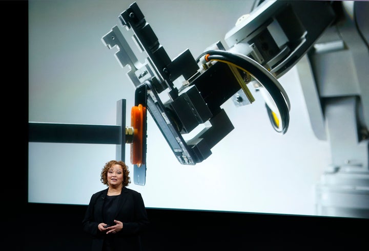 Lisa Jackson, Apple vice president for environment, policy and social initiatives, introduces a robot named Liam that deconstructs iPhones for recycling.