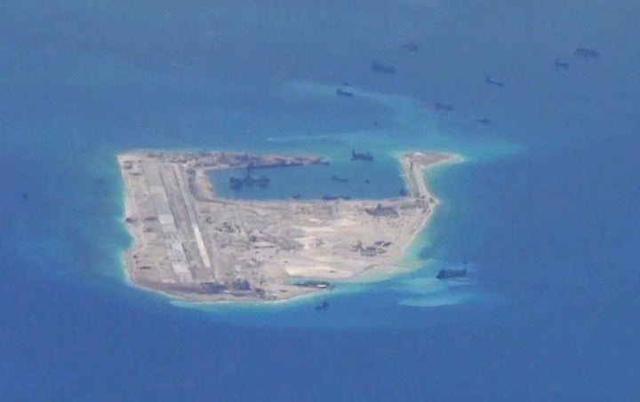 Chinese media outlets reported for the first time on Monday on the landing of a military plane on one of the disputed islands
