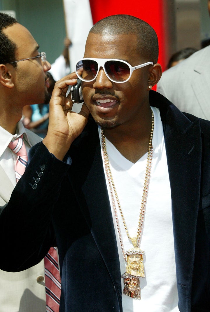 Kanye with his phone in 2004.