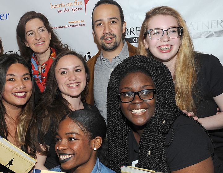 Lin-Manuel Miranda with Girl Be Heard co-founder and Executive Director Jessica Greer Morris, and the young women who performed.