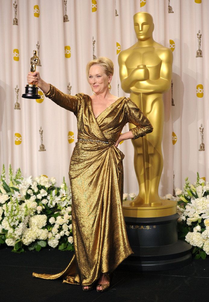 Meryl showing off her award for Best Actress at the 84th annual Academy Awards.