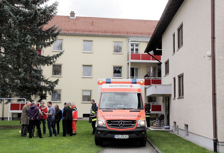 An ambulance at the Rosenheim apartment where a 26-year-old woman is believed to have been locked up by her mother, possibly for years