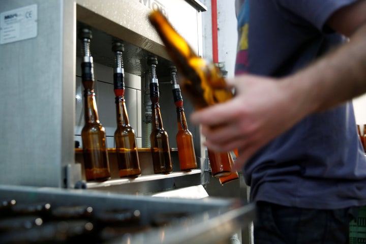 An employee works at Herzl Brewery which produced a craft beer from wheat that Tel Aviv University geneticists identified as the strain used for beer in the Holy Land two millennia ago.