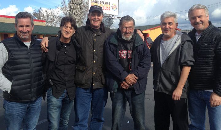 The Waldos pose with Newman, third from the right, outside a motel in San Jose.