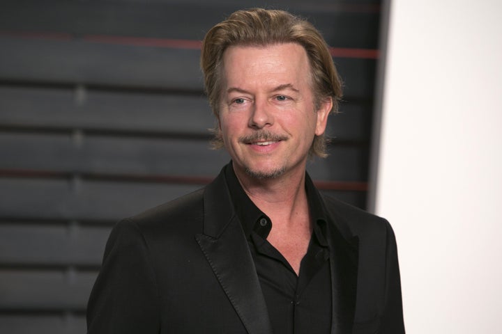 US actor and producer David Spade poses as he arrives to the 2016 Vanity Fair Oscar Party in Beverly Hills, California on Feb