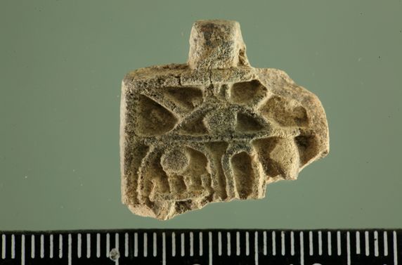 An 8-year-old unearthed this amulet, bearing the partial name of Egyptian Pharaoh Thutmose III, in Jerusalem. It's estimated to be 3,200 years old.