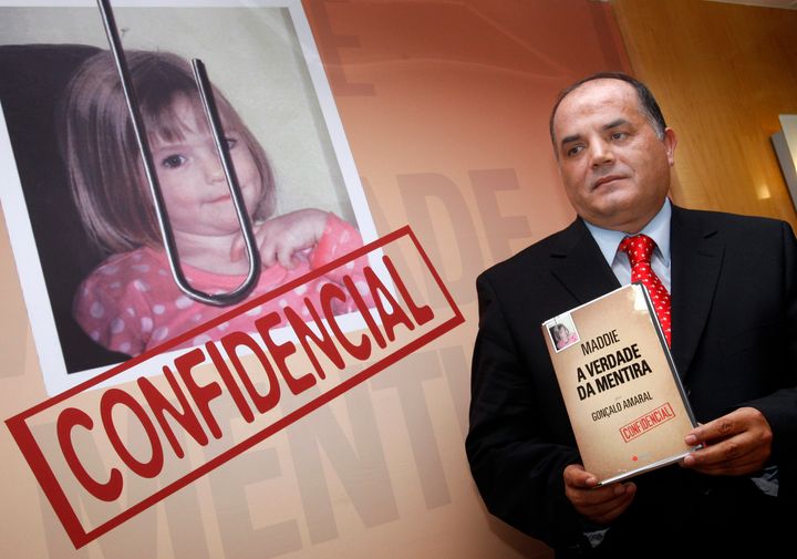 Former detective Goncalo Amaral poses with his book in 2008