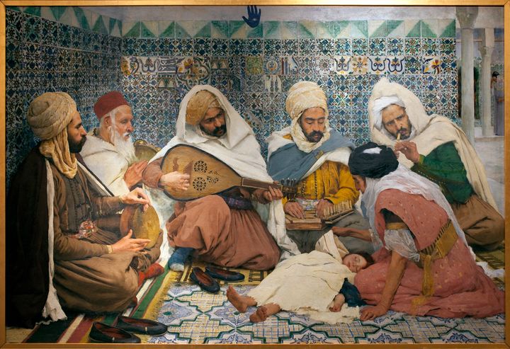 The exorcism, by French painter Andre Brouillet. Arab musicians singing to a child in order to exorcise the Djinn evil spirit that has taken over his body