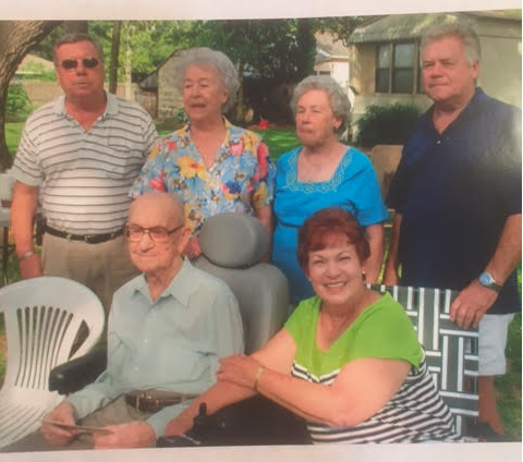 A recent family photo of Felix Simoneaux Jr. with his five surviving children.